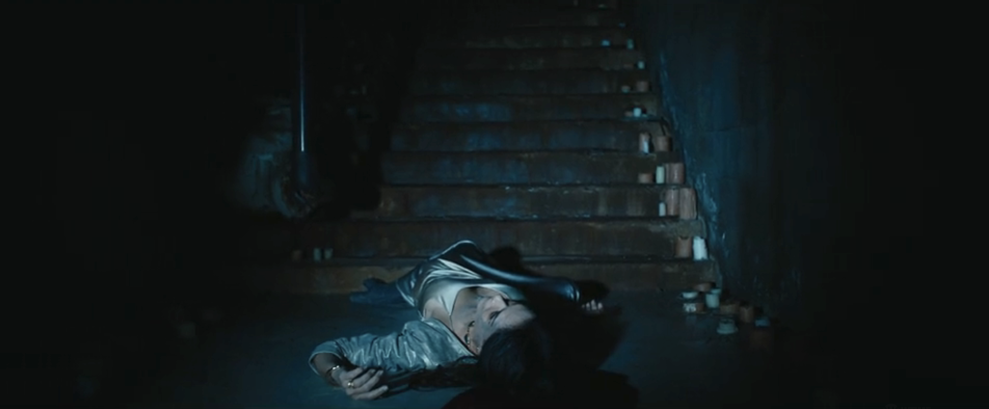 Lottie DEAD in a stairwell